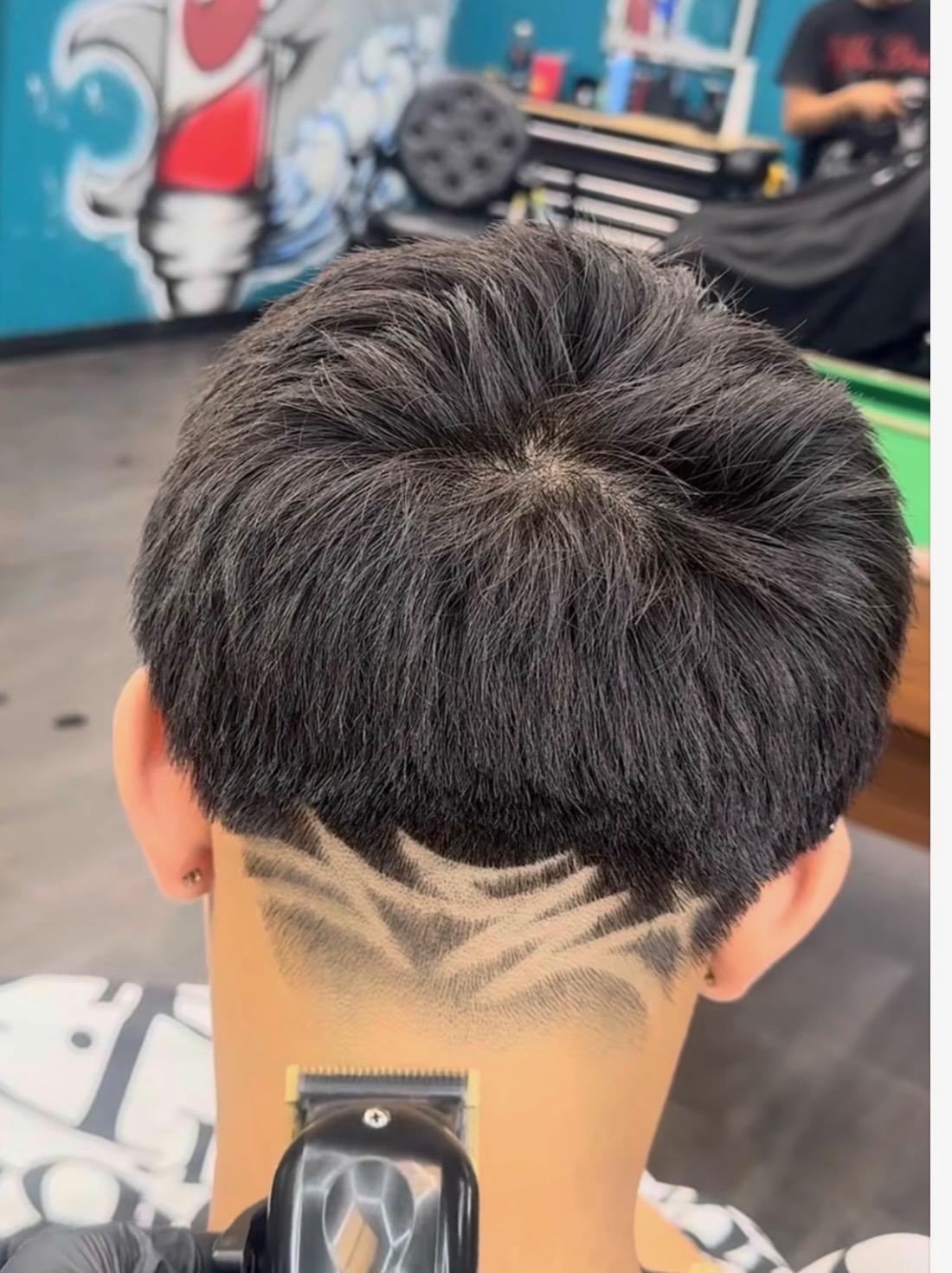 Hair design cut with detailed neckline pattern