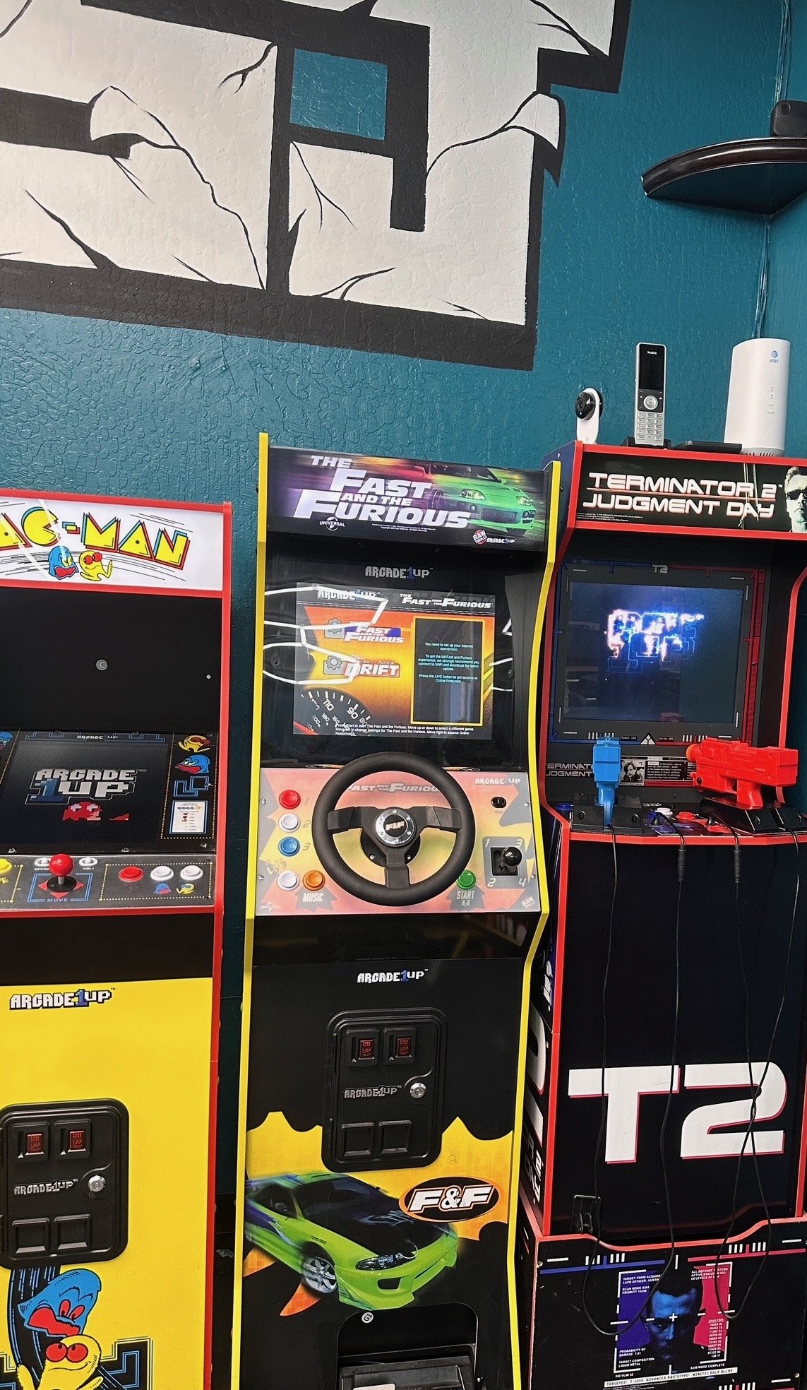 Arcade games inside New Wave of SJ Barbershop waiting area